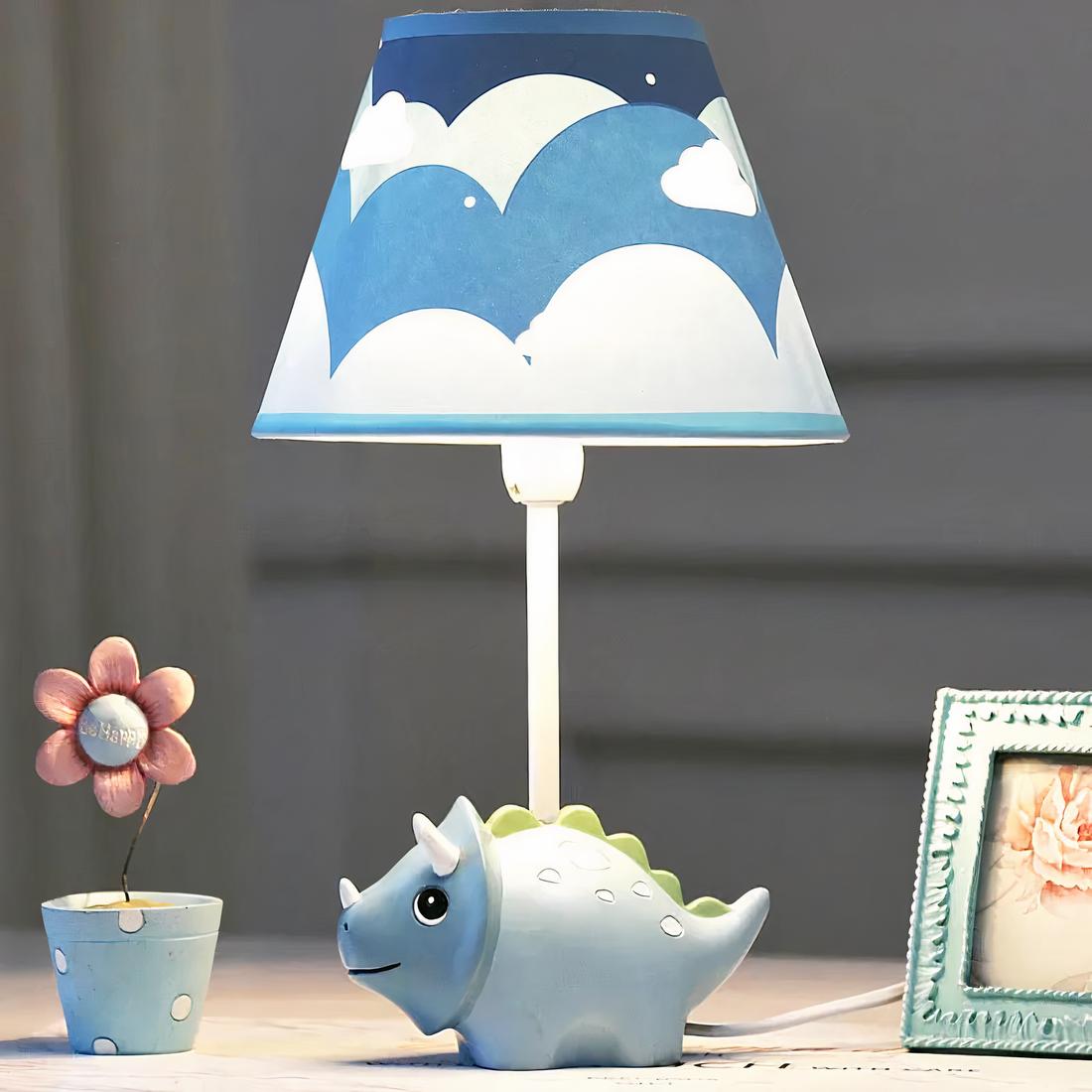 Lampe de chevet en forme de dinosaure à intensité réglable avec un fond une table