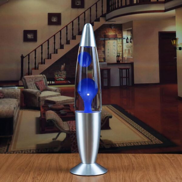 Lampe à lave métallique bleue posée sur une table