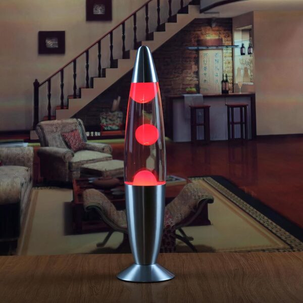 Lampe à lave métallique rose posée sur une table