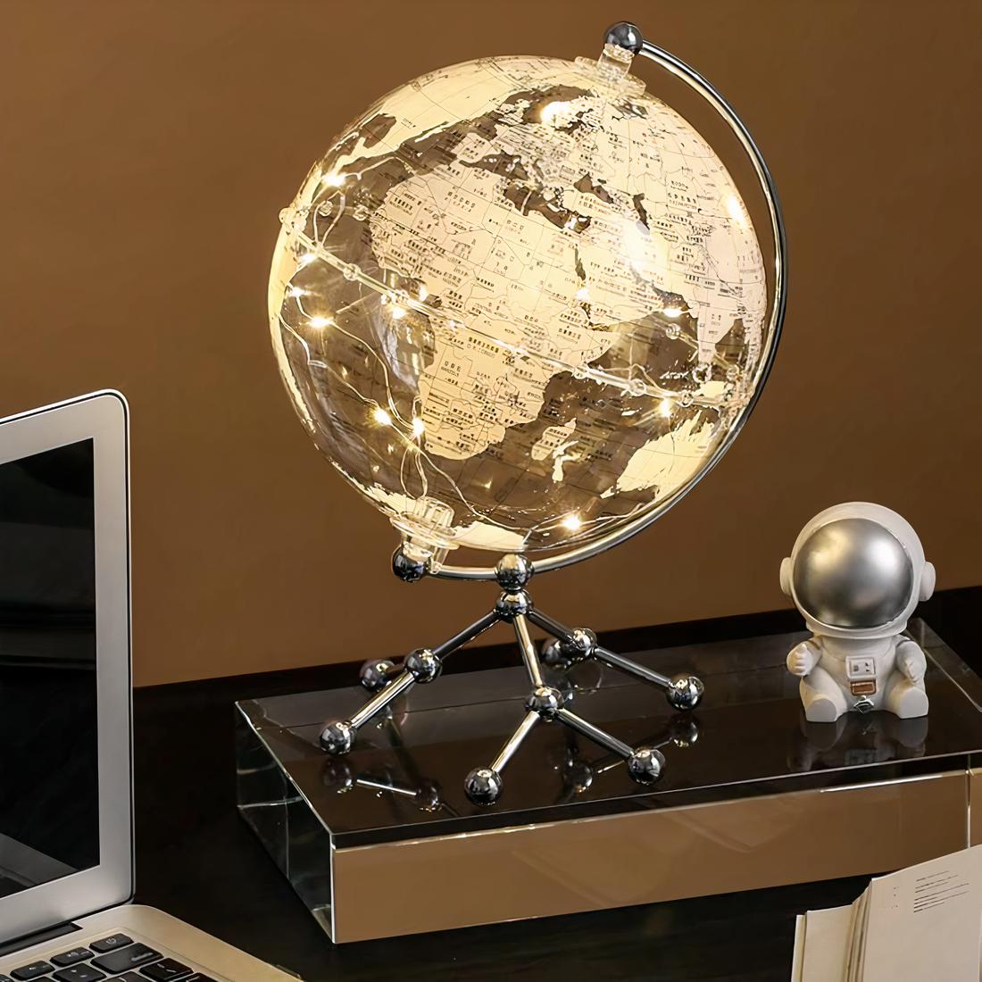 Lampe de chevet lobe terrestre blanche posé sur une table