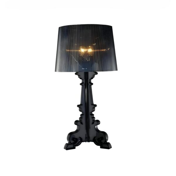 Lampe de chevet en acrylique noir translucide avec l'ampoule allumée. Design vintage de style italien avec un pied et un abat-jour.