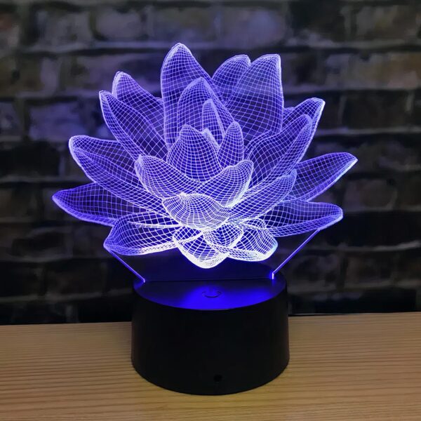 Lampe de chevet lotus en acrylique multicolore posé sur une table